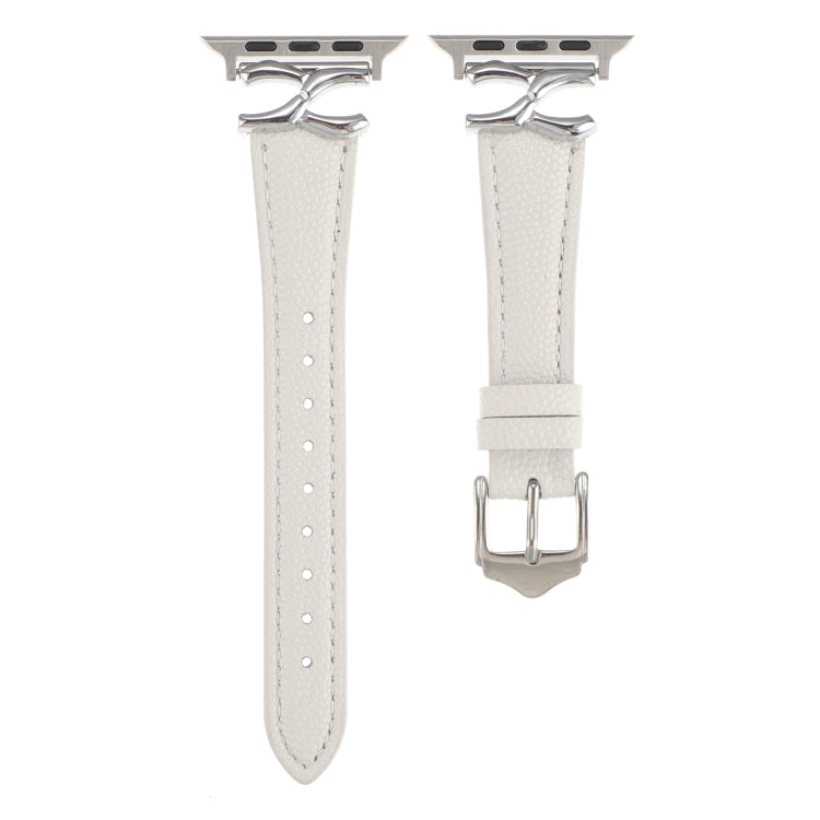 White leather Apple Watch band with silver X-shaped connectors and buckle