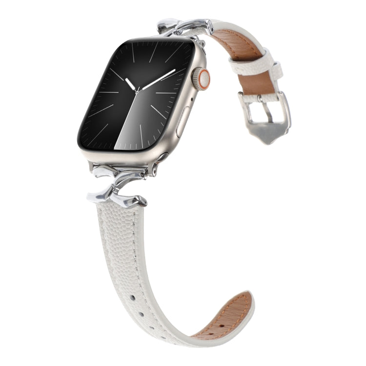 White leather Apple Watch band with perforations and silver buckle, shown open