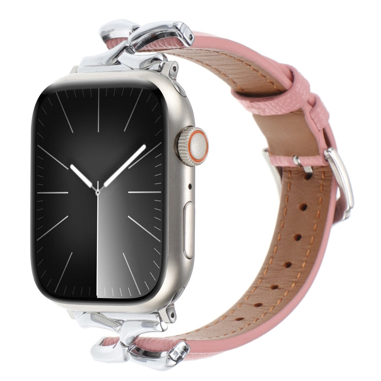Pink genuine leather Apple Watch band with silver X-shaped connectors and buckle
