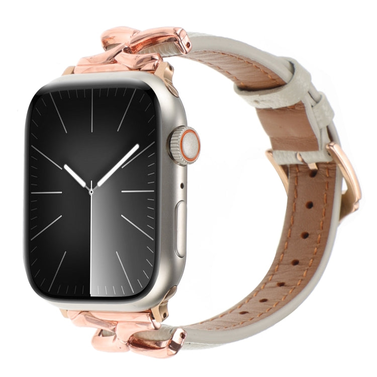 White genuine leather Apple Watch band with rose gold X-shaped connectors and buckle