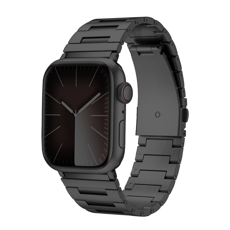 Black titanium alloy band with an Apple Watch, shown at an angled front view.