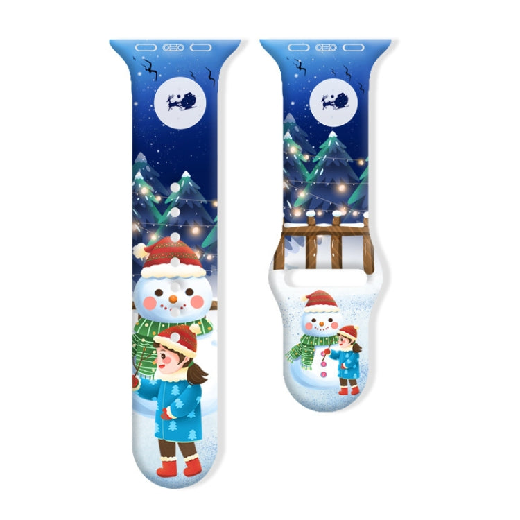 Blue silicone watch band with a snowman and child in a snowy scene