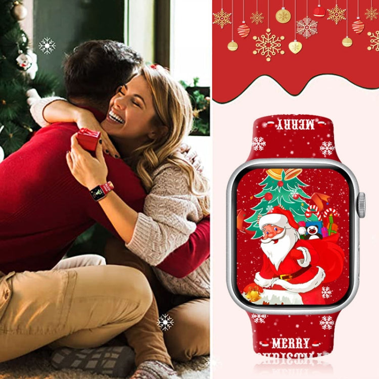 Red Christmas silicone watch band with a Santa and tree design, shown on a watch