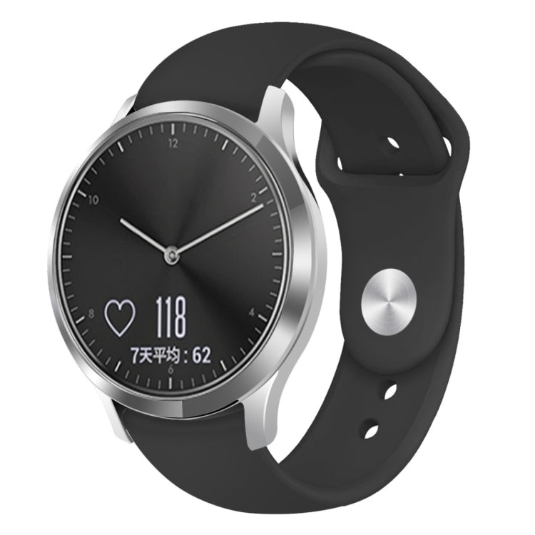 Black silicone watch strap with reverse buckle, worn with a round smartwatch