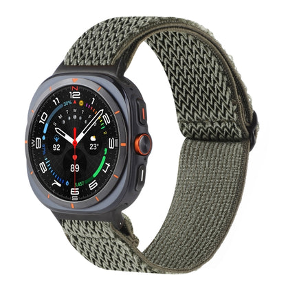 Olive green nylon braided watch band with a wave pattern, shown on a smartwatch.
