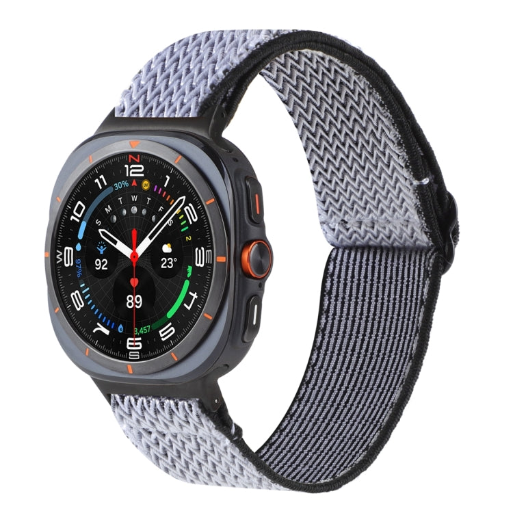 Light gray braided watch band with black edging on a smartwatch