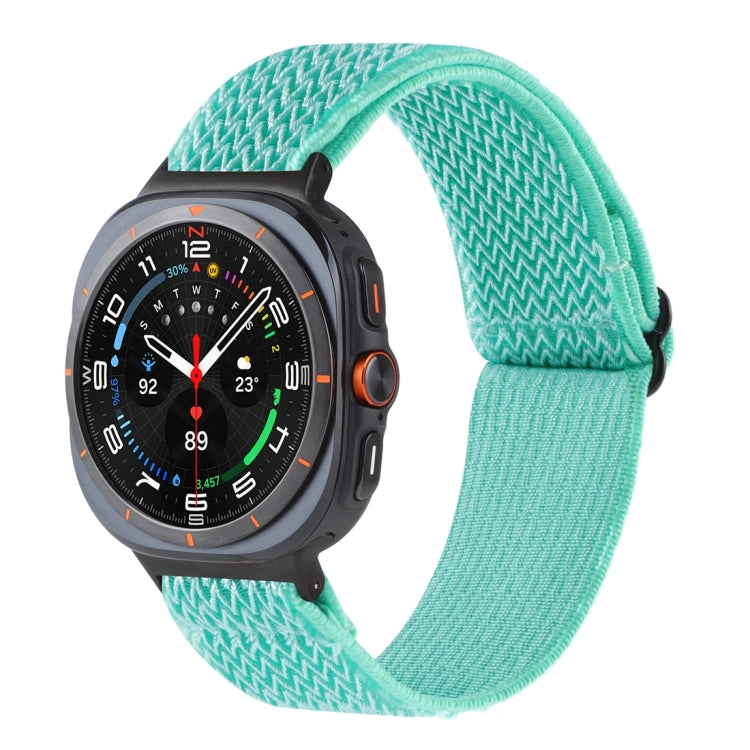 Mint green nylon braided watch band with a wave pattern, shown on a smartwatch.