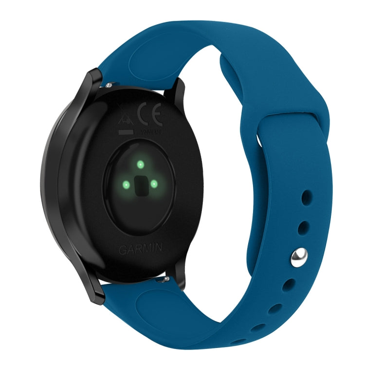 Teal blue silicone watch strap with reverse buckle, size small, close-up on band holes