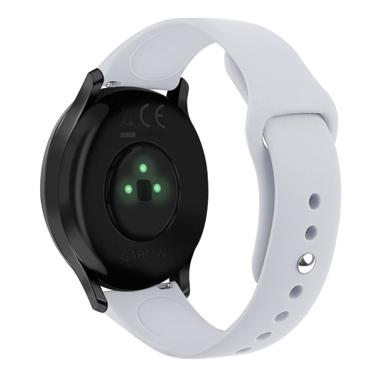 Light gray silicone watch strap with reverse buckle, size small, close-up on band holes
