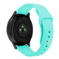 Turquoise silicone watch strap with reverse buckle, size small, close-up on band holes