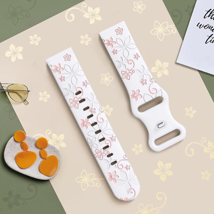 Two-piece white silicone watch band with pink floral embossing