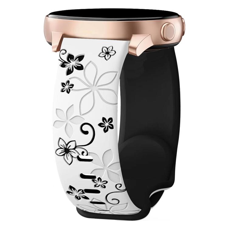 White and black silicone watch band with embossed floral design