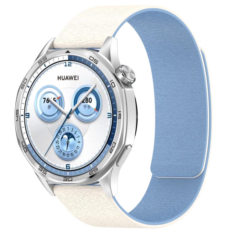 Cream and light blue silicone magnetic watch band on a Huawei watch