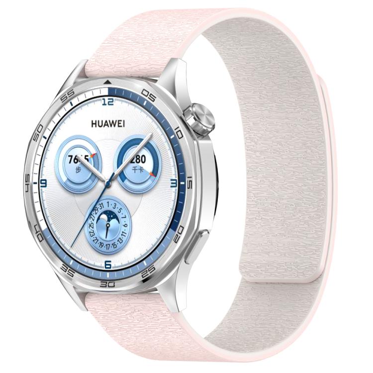 Pale pink silicone magnetic watch band with a light gray lining on a Huawei watch