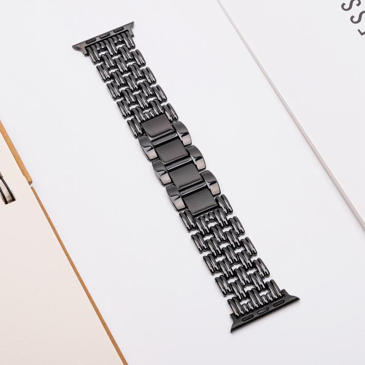 Black five-bead stainless steel Apple Watch band with wide center links.