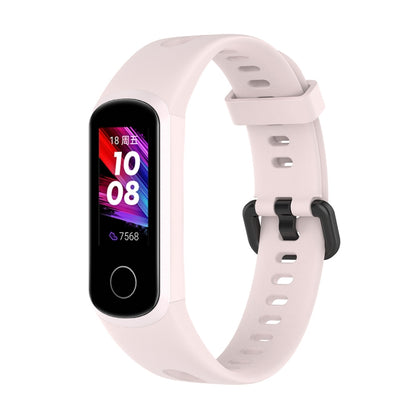 Metal buckle silicone smartwatch strap in light pink, with perforated band and clasp