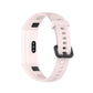 Metal buckle silicone smartwatch strap in light pink, side view of clasp and holes