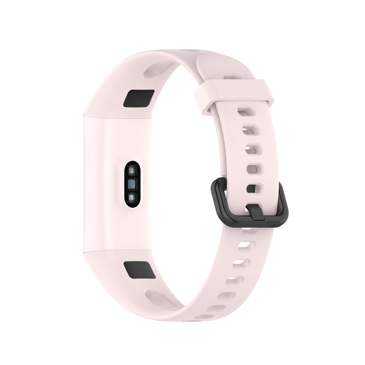 Metal buckle silicone smartwatch strap in light pink, side view of clasp and holes
