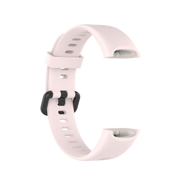 Metal buckle silicone smartwatch strap in light pink, buckle and underside view