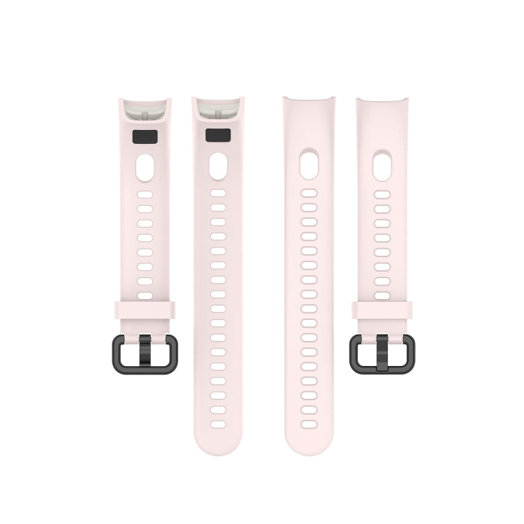 Set of metal buckle silicone smartwatch straps in light pink with perforated bands