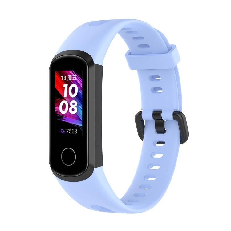Light blue silicone smartwatch strap with metal buckle and perforated adjustment holes