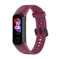 Dark purple silicone smartwatch strap with metal buckle and perforated adjustment holes