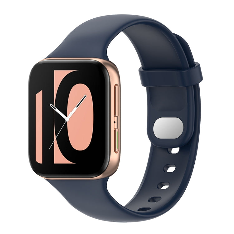 Gray-blue silicone watch strap with clasp and smartwatch face visible