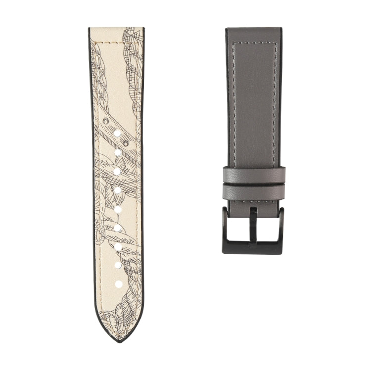 Beige patterned watchband strap with gray backing and dark buckle clasp