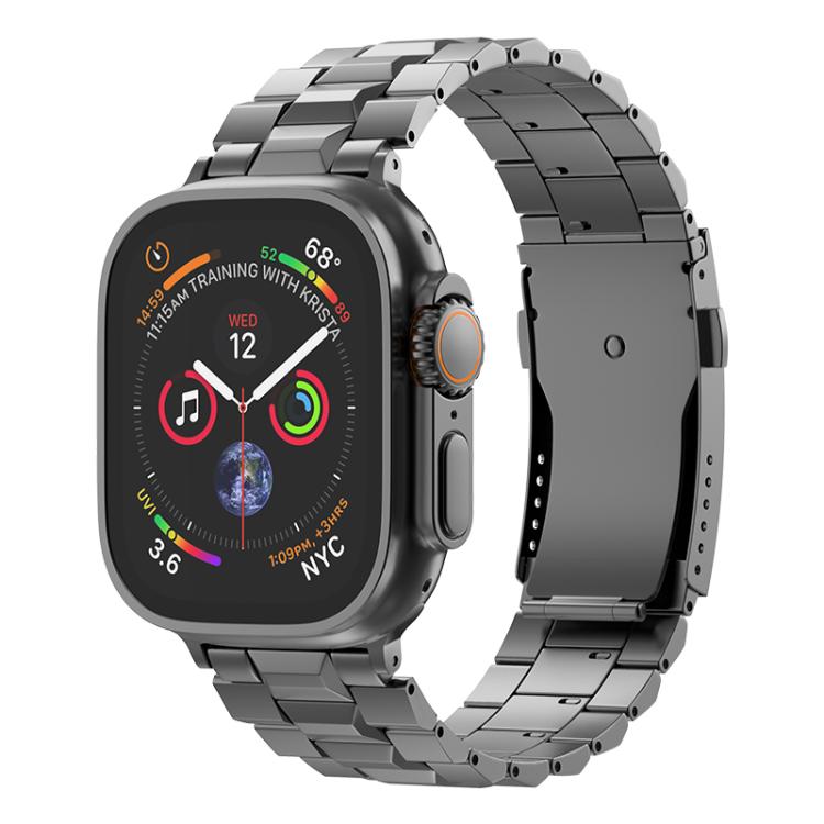 Dark gray titanium link watch band with a folding clasp, shown on an Apple Watch.