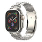 Silver titanium link watch band with a folding clasp, shown on an Apple Watch.