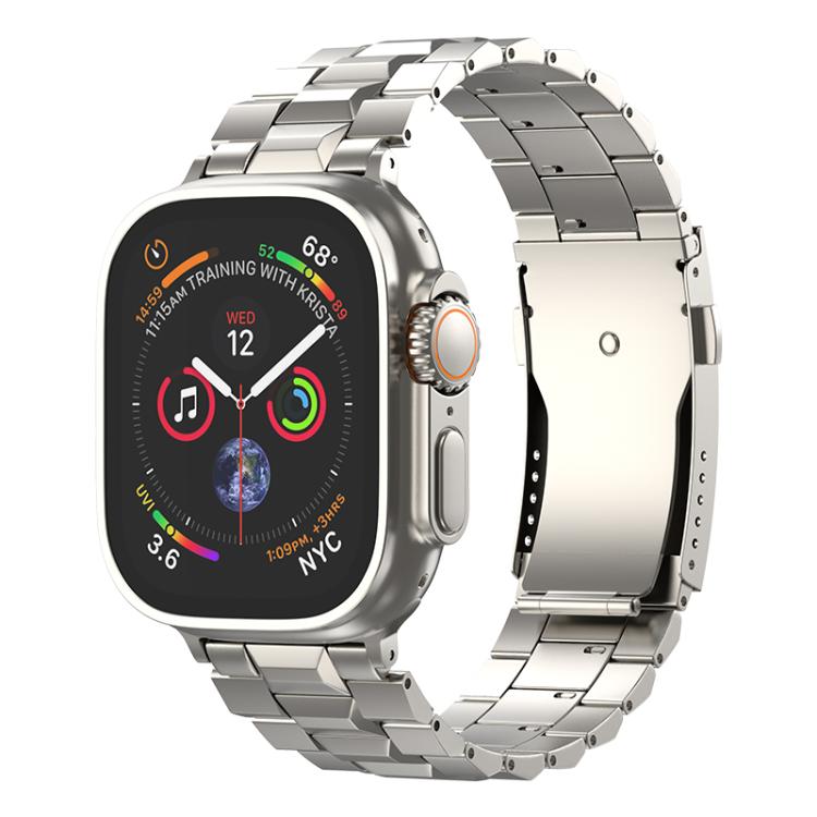 Silver titanium link watch band with a folding clasp, shown on an Apple Watch.