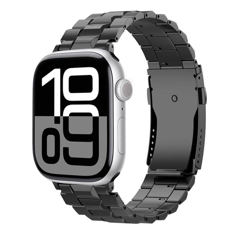 Dark gray titanium link watch band with a folding clasp, shown on an Apple Watch with a digital display.