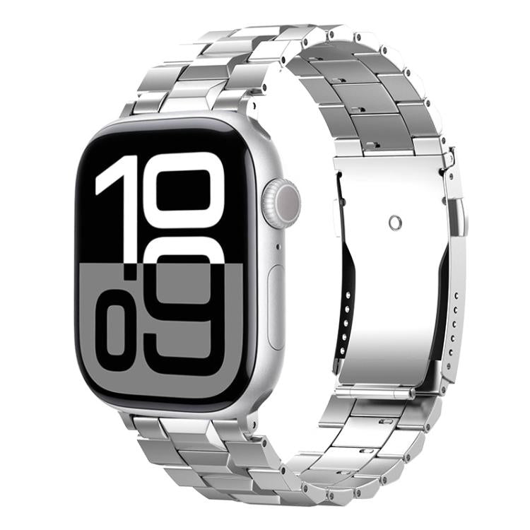 Silver titanium link band with folding clasp on an Apple Watch with a digital display.