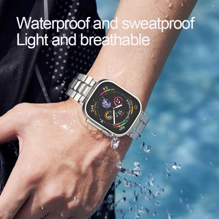 Silver titanium link watch band worn in splashing water