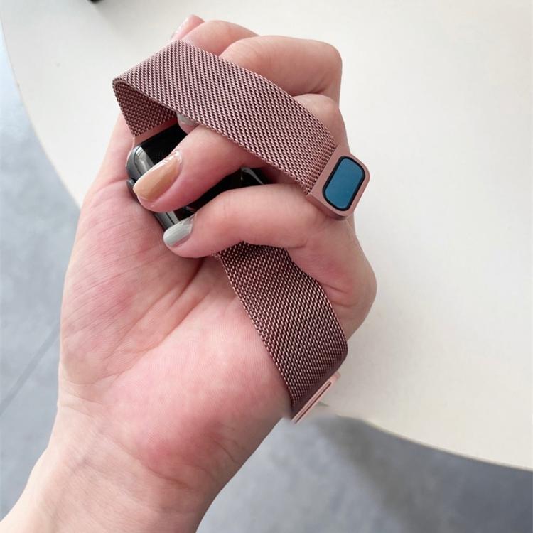 Rose gold Milanese watch band with a blue magnetic clasp