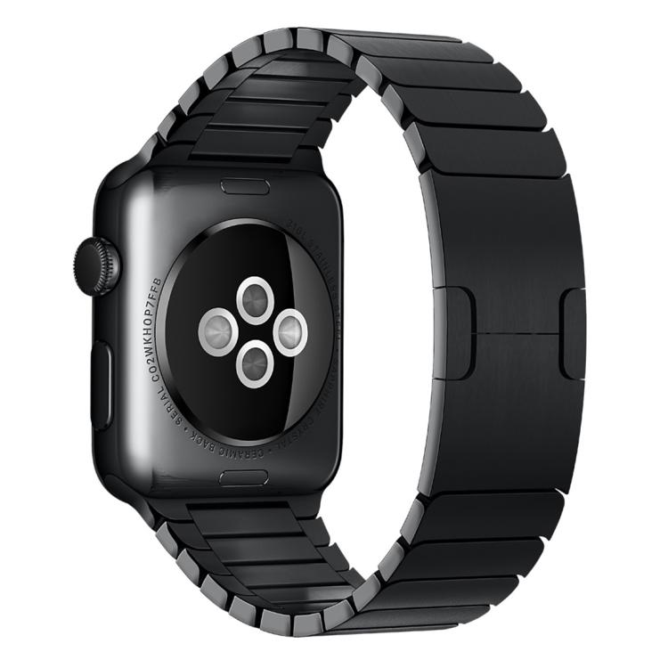 Black linked stainless steel Apple Watch band shown attached to the back of a watch.