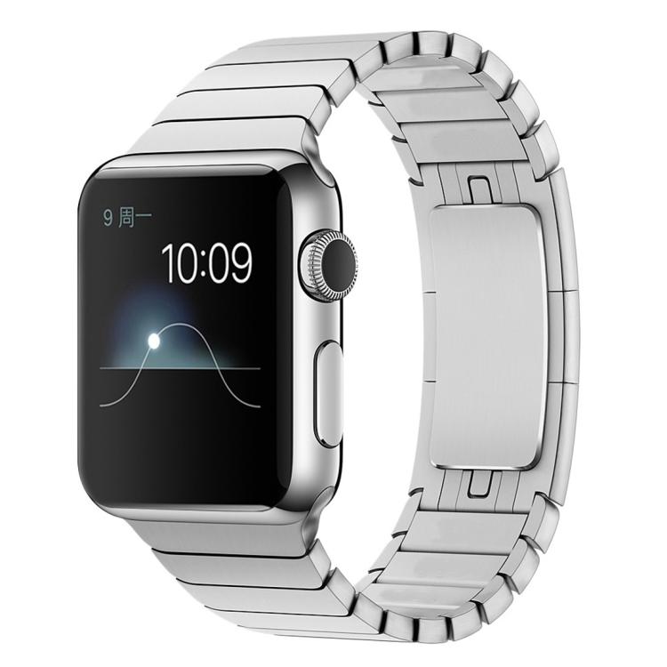 Silver linked stainless steel Apple Watch band shown with the watch face.