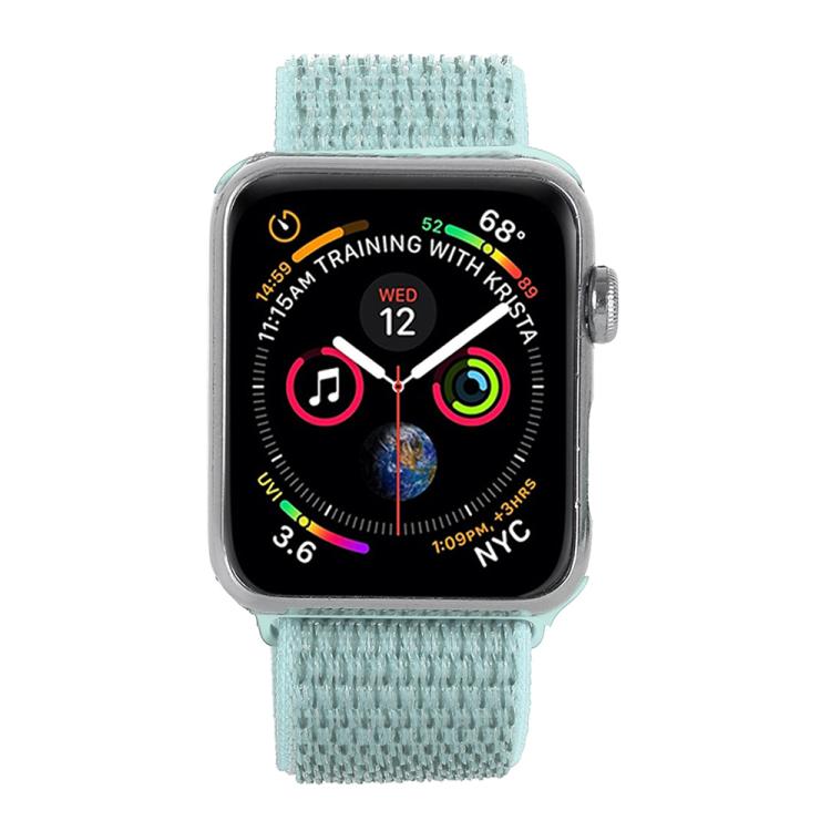 Mint green nylon hook-and-loop watch band on a smartwatch, front view