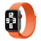 Orange nylon hook-and-loop watch band wrapped around a smartwatch