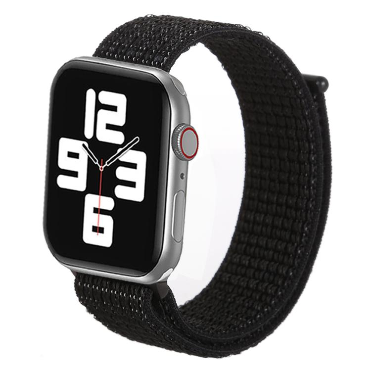 Black nylon hook-and-loop watch band wrapped around a smartwatch
