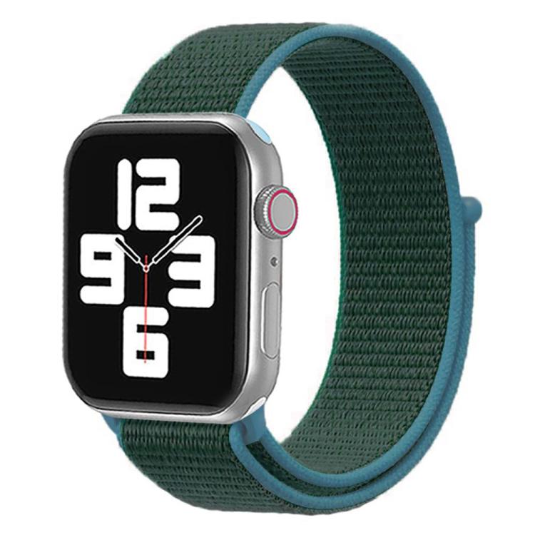 Apple Watch with a dark green woven nylon band and teal hook-and-loop trim