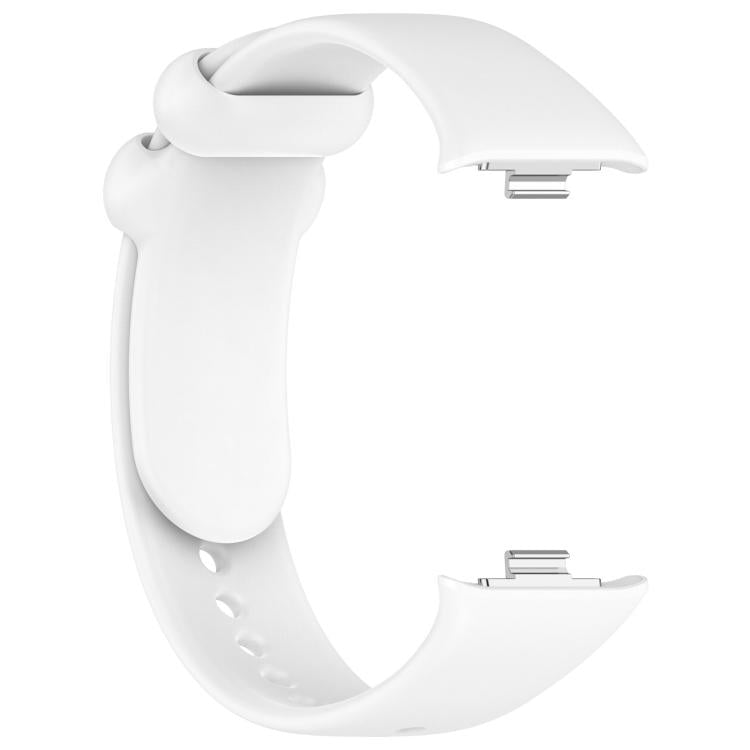 White silicone smartwatch band showing its buckle, keeper loop and exposed connectors