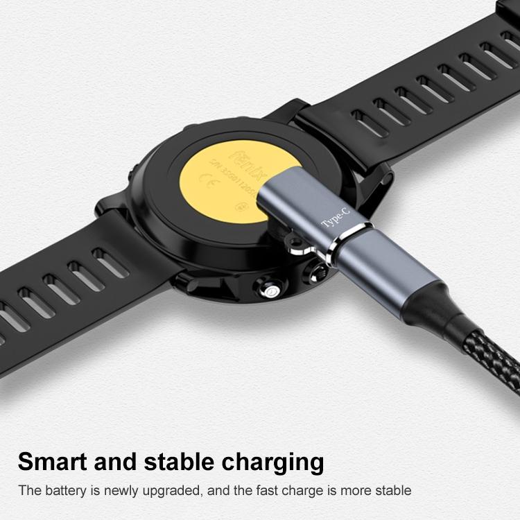 Straight charging adapter connected to the back of a Garmin watch and a charging cable