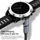 Straight charging adapter plugged into the back of a Garmin watch