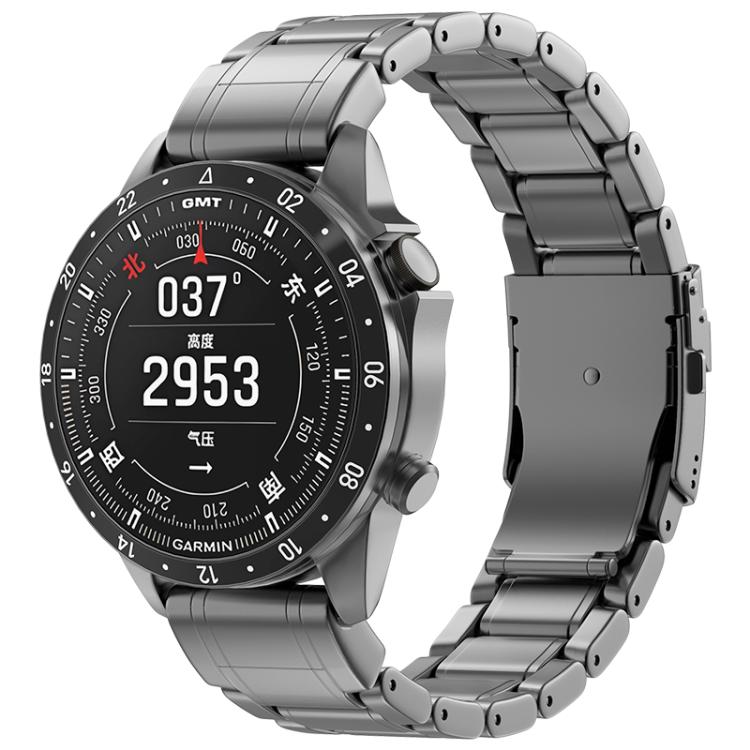 Gray titanium metal watch band with safety clasp, shown on a Garmin watch
