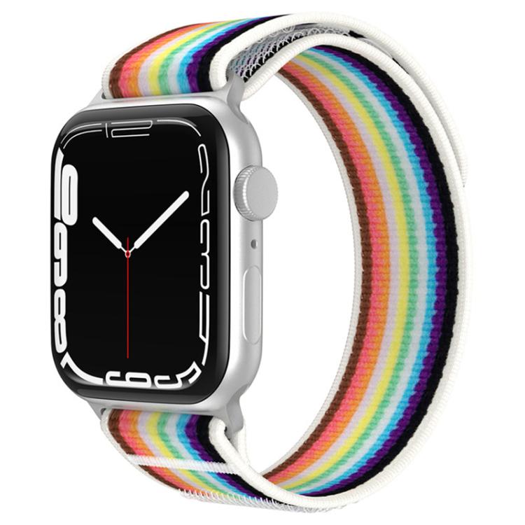 White nylon loop watch band with bright rainbow stripes on a silver smartwatch