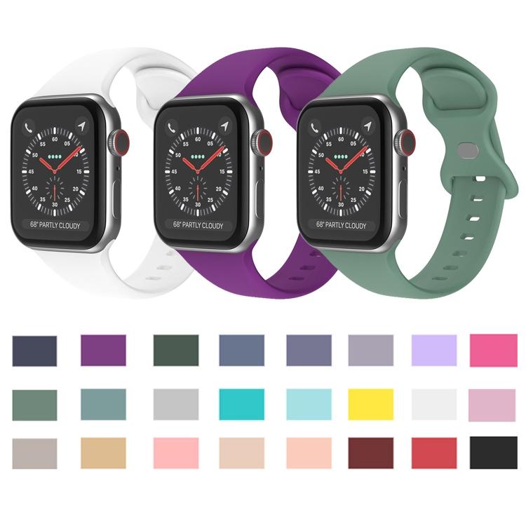 Silicone Apple Watch bands with butterfly buckles in assorted colors