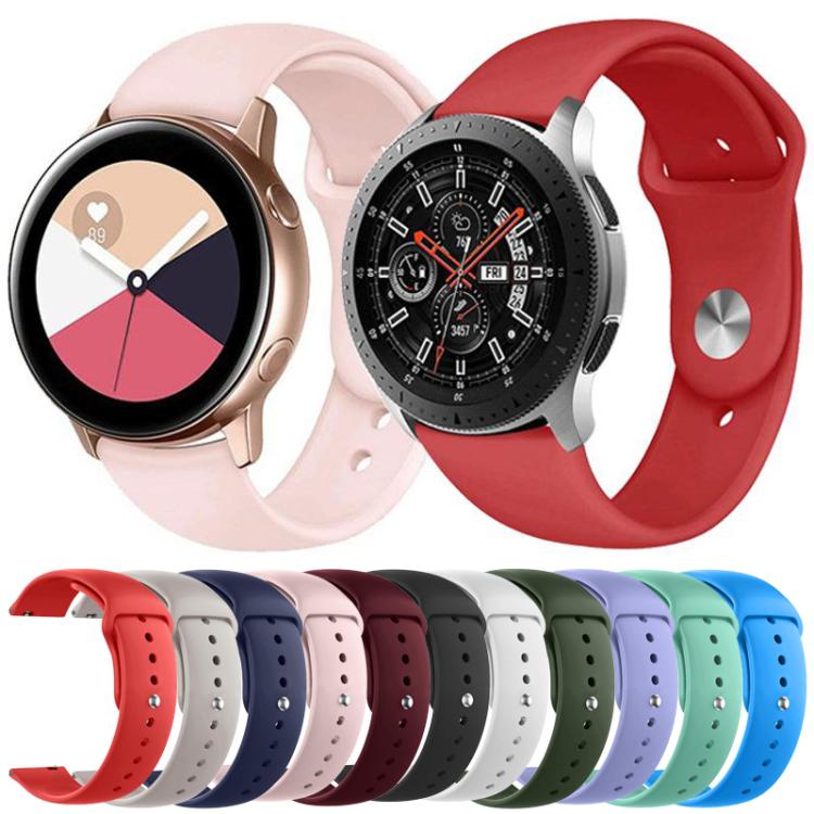 Silicone watch bands in assorted colors, shown on watches and arranged side by side