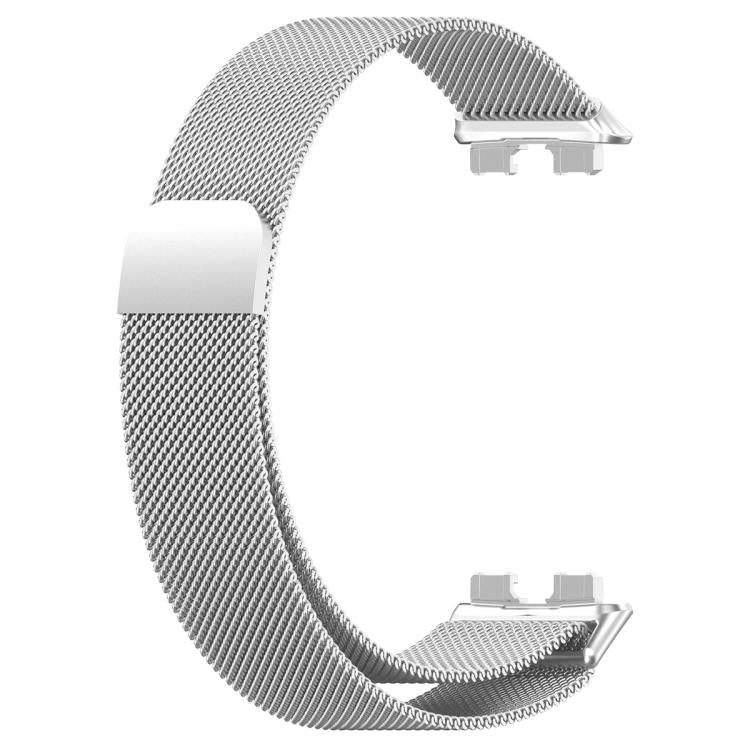 Silver mesh metal watch band with a magnetic clasp.