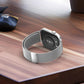 Silver Milanese metal watch band attached to a smartwatch, shown from the back